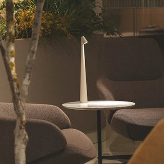 Compact portable lamp, versatile design