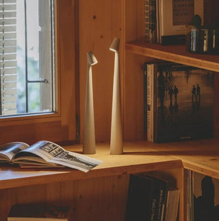 Compact portable lamp, versatile design