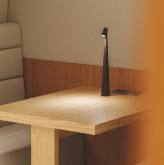 Compact portable lamp, versatile design