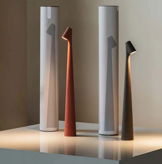 Compact portable lamp, versatile design