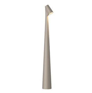 Compact portable lamp, versatile design