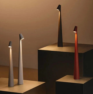 Compact portable lamp, versatile design