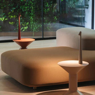 Compact portable lamp, versatile design