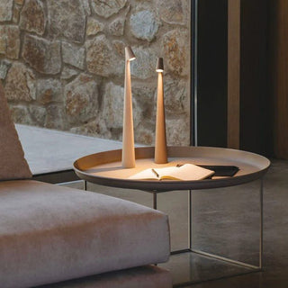 Compact portable lamp, versatile design