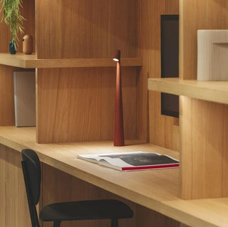 Compact portable lamp, versatile design