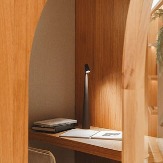 Compact portable lamp, versatile design
