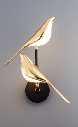 Artistic wall fixture, bird-inspired design